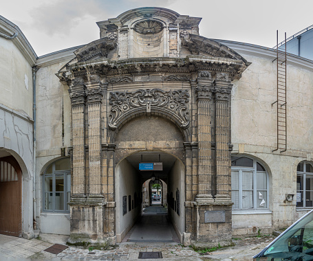Chalons-en-Champagne, France - 09 01 2023: View of the facade of 17th century portal from the Saint Loup church in passage Henri Vendel