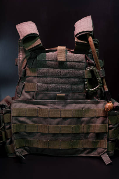 istock Bulletproof vest on a black background 1669517710