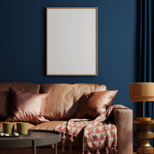 istock Blank picture frame in blue modern living room with leather sofa.3d rendering 1669553359