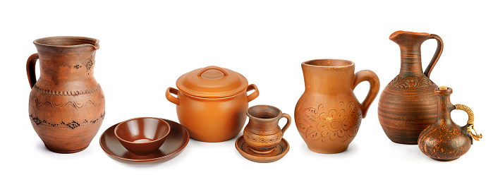 Set of earthenware isolated on white background. Wide photo. Free space for text. Collage.