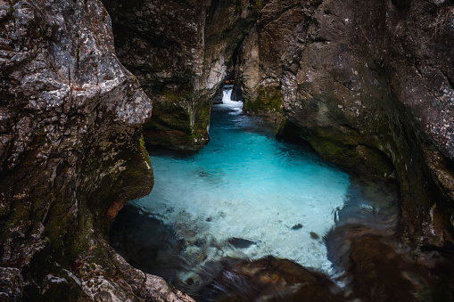 Small waterfall in idyllic gorge with turquoise water (Predaselj gorge).
