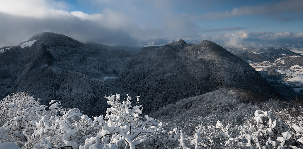 Snowcapped hills above Celje, Slovenia.