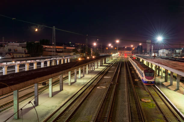 istock Night railway station landscape 1669630728