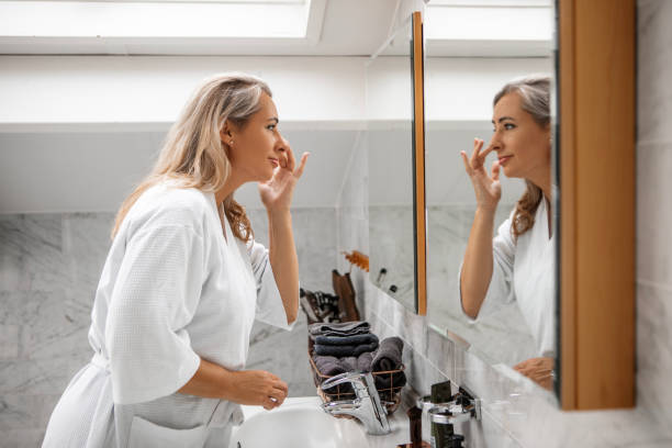 istock Bathroom routine for beautiful middle aged blonde woman 1669643080