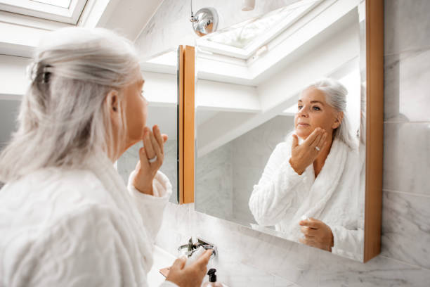 istock Bathroom routine for beautiful senior blonde woman 1669644825