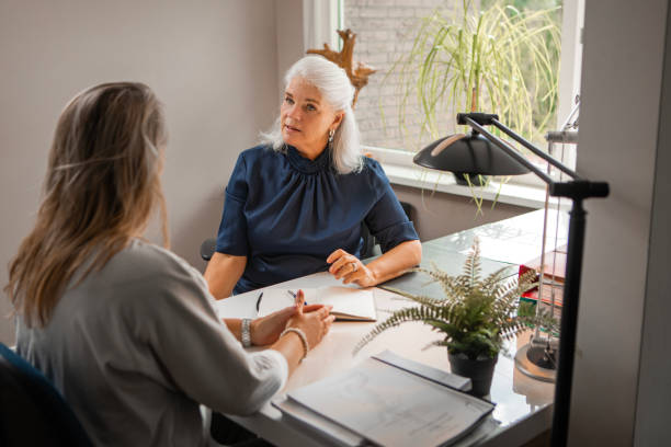 Counselling session between female accountancy specialist and client