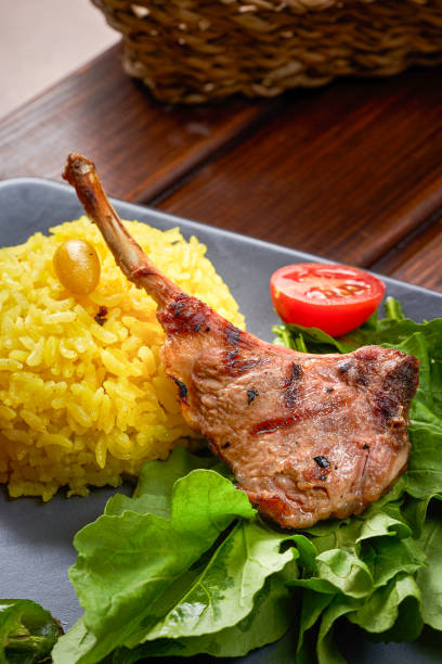 istock grilled lamb ribs with rice and leafy vegetables 1669694268