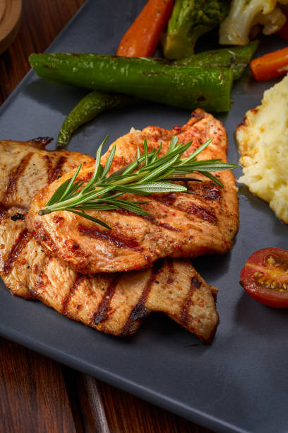 istock grilled chicken breast with mashed potatoes and rosemary 1669701921