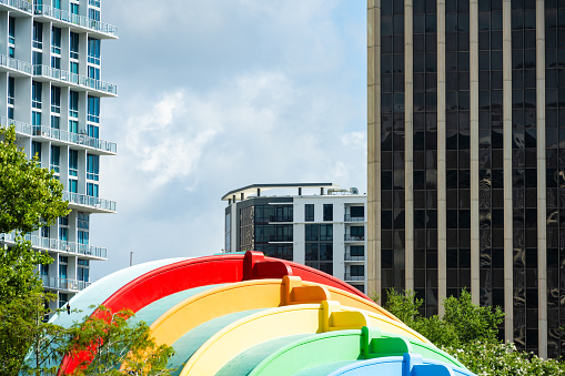Downtown Orlando cityscape showing part of the rainbow painted amphitheater in Florida, USA.
