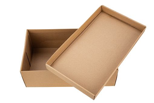 Open cardboard box for shoes. Isolated on a white background. File contains clipping path