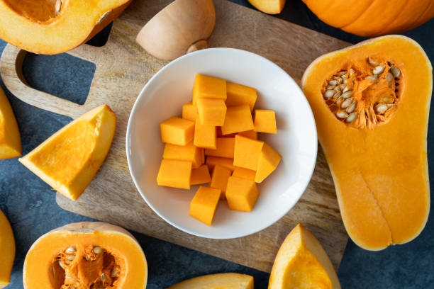 istock Diced butternut squash pumpkin. Preparing seasonal autumn fall food. 1669820078