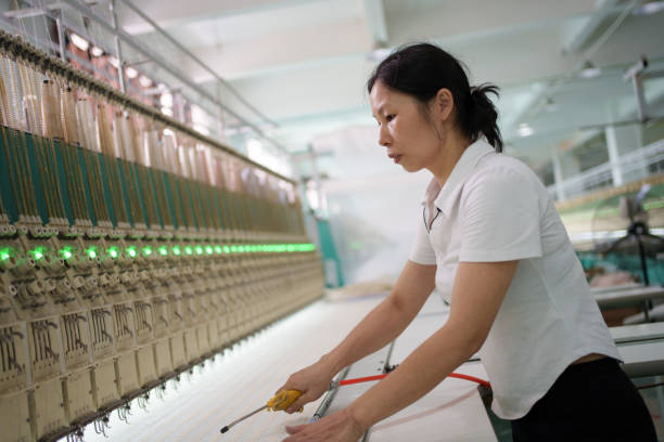 istock Female worker in textile factory 1669847324