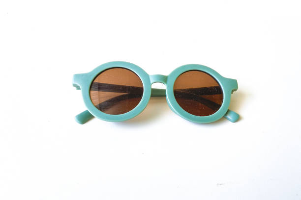 istock green baby sun glasses on a white background 1669847867