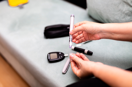 Preparing an insulin shot at home, caring for the health