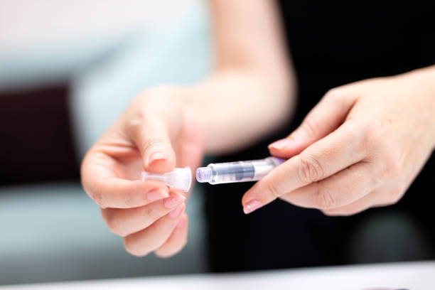 istock woman is opening insulin pen 1669867499