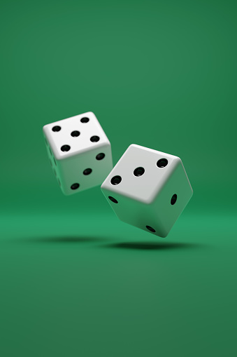Closeup view of two dice on green background. 3d illustration.