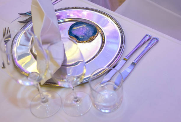 istock Festive table setting. Glasses and metal dish. 1669883936
