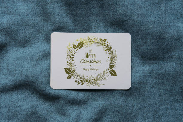 istock Card with hand drawn style gilded Christmas wreath 1669884002
