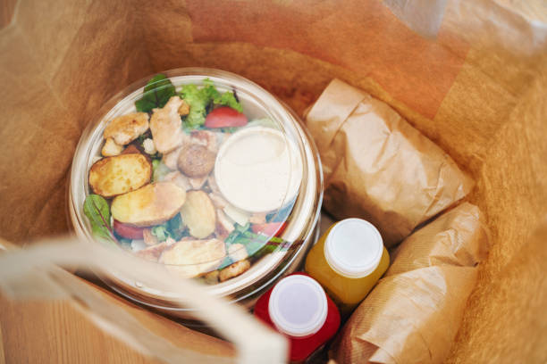 Paper bag with takeaway food ready for delivery