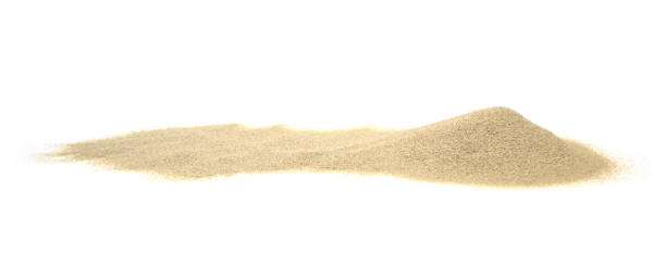 istock pile desert sand isolated on white background. 1669884560