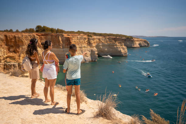Tourism on Benagil beach in Carvoeiro, Algarve, Portugal