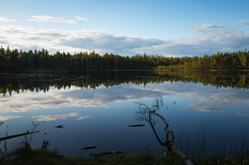 beautiful lake landscape with blue sky and clouds