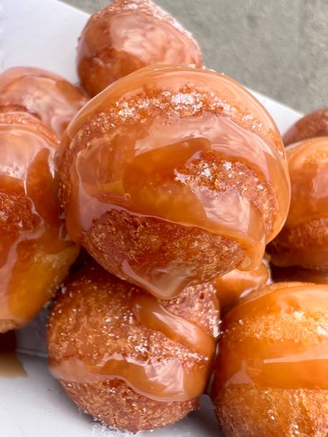 istock Lokma - Donut Balls with caramel Sauce in box 1669917481