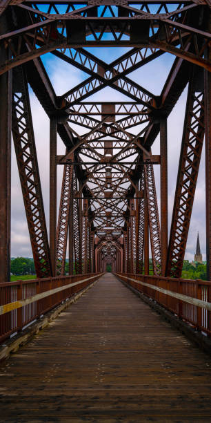 istock Fredericton Railway Bridge or Bill Thorpe Walking Bridge over St John River in New Brunswick, Canada 1669934403
