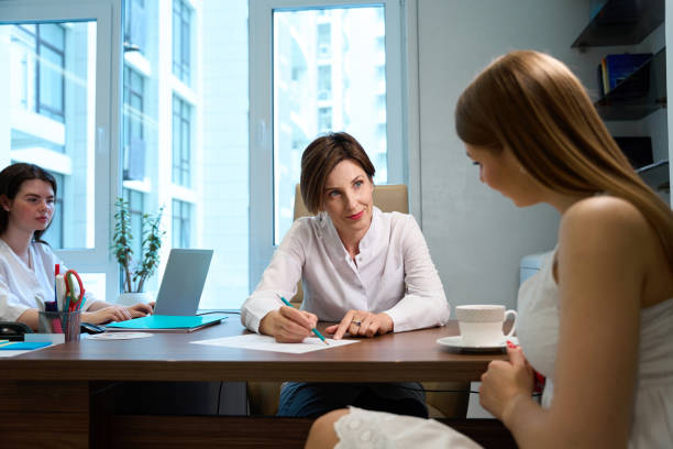 istock Female doctor conducts an appointment in a bright office 1669934861