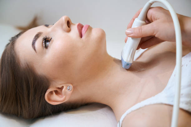 istock Young woman undergoing a thyroid ultrasound procedure 1669934903