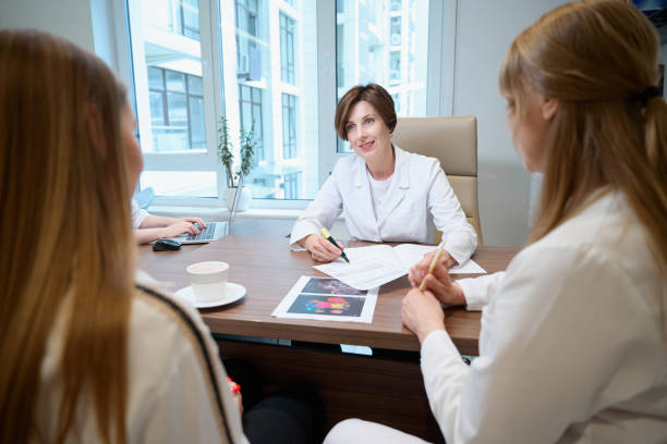 istock Fertility specialist communicates with a young woman 1669935055