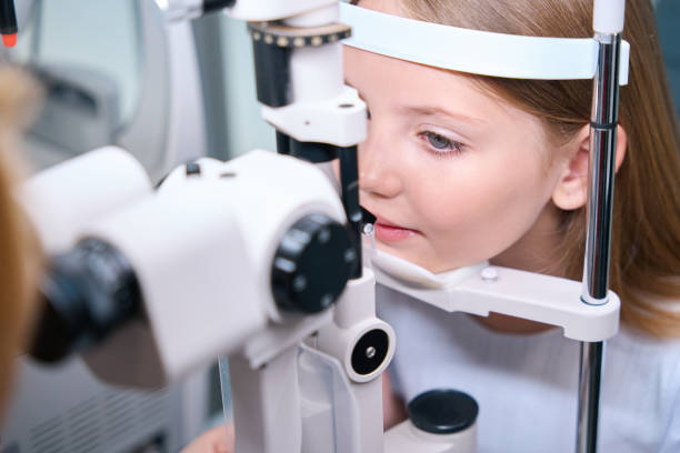 istock Child having his eyes checked with ophthalmic equipment 1669935677