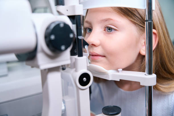 istock Pediatric patient undergoing eye examination on modern medical equipment 1669936184