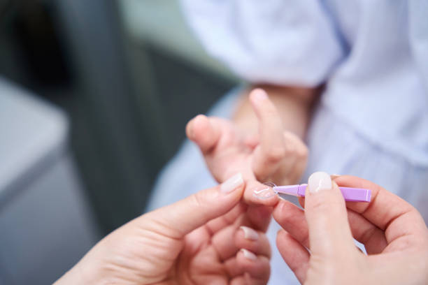 istock Experienced eye doctor teaching child how to insert ophthalmic lenses 1669936241