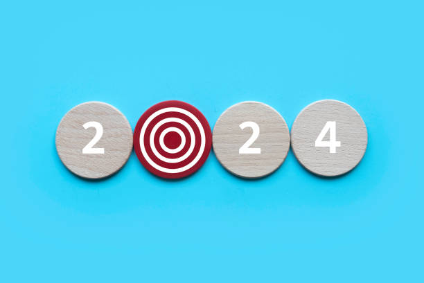 istock New year concept. Target symbol with wooden circle written with number. 1669969143