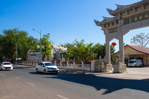 Road to Patuxai Victory Gate with cityscape of the capital city in Vientiane