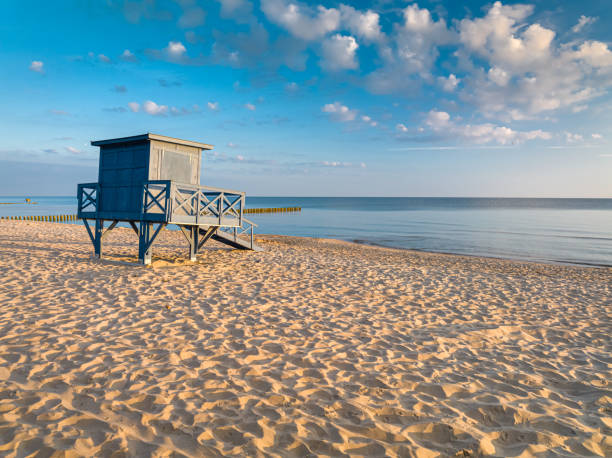 istock Lifeguard hut on beach at sunrise by Baltic Sea 1670050882