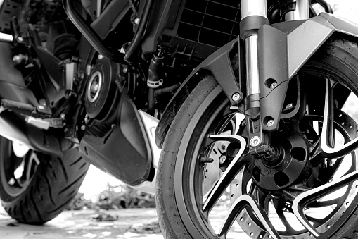 black speedy racing motorcycle parked