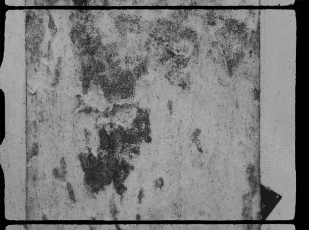 istock grungy looking film frame border overlay. 1670178815