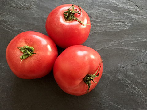 tomato on white with splash