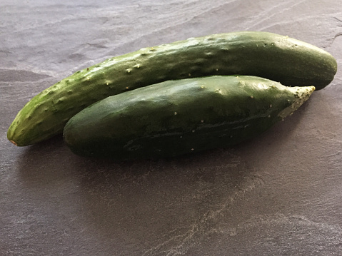 Fresh organic cucumbers with copy space