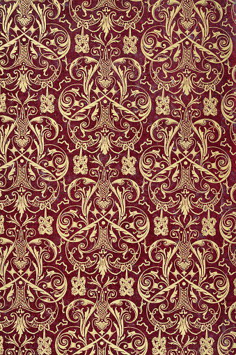 Vintage illustration of Ornate gold pattern on a maroon background, 18th Century French