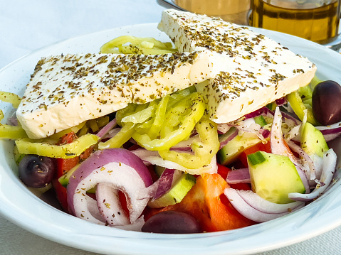 tasty greek salad with fresh ingredients