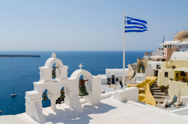 istock Four bells tower in Oia, Santorini 1670329348