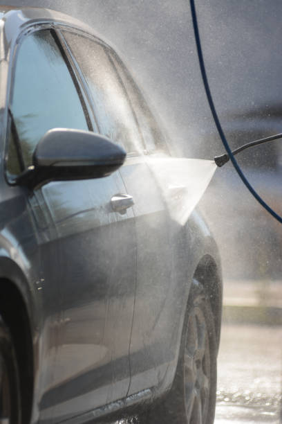 istock Washing a car with sunlight in the background 1670383718