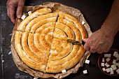 Traditional Greek pie - snail with cheese. Roll with cheese filling.