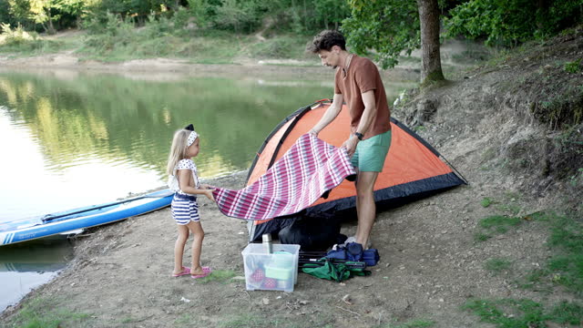 Father and daughter on a camping trip