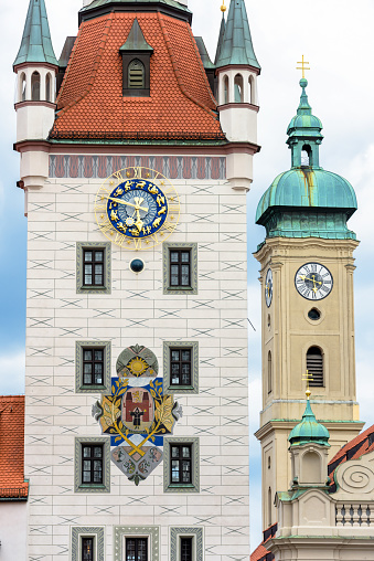 Clock Tower of Old Town Hall (Rathaus) in Munich, Bavaria, Germany. It is landmark of Munich located on Marienplatz square. Detail of Gothic building with clock chime in Munich city center