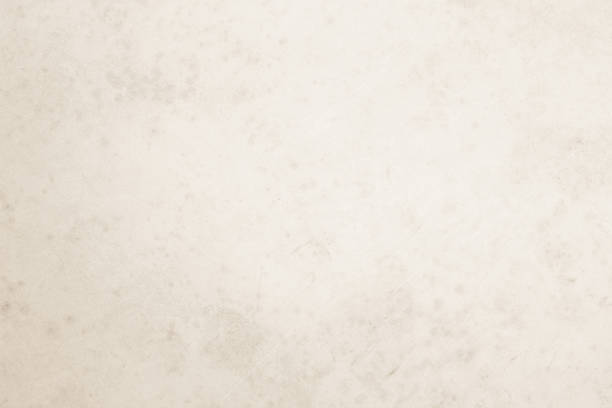 istock Colour old concrete wall texture background. Close Up retro plain cream color cement wall background texture. Design paper vintage parchment element show or advertise or promote product on display. 1670731793