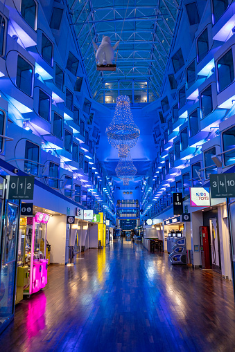 Stockholm, Sweden Aug 21, 2023 The colorful interior promenade of the Silja Line ferry to Helsinki, Finland with shops and restaurants.